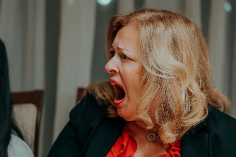 OVATION! adult acting student reacting in character during a film shoot