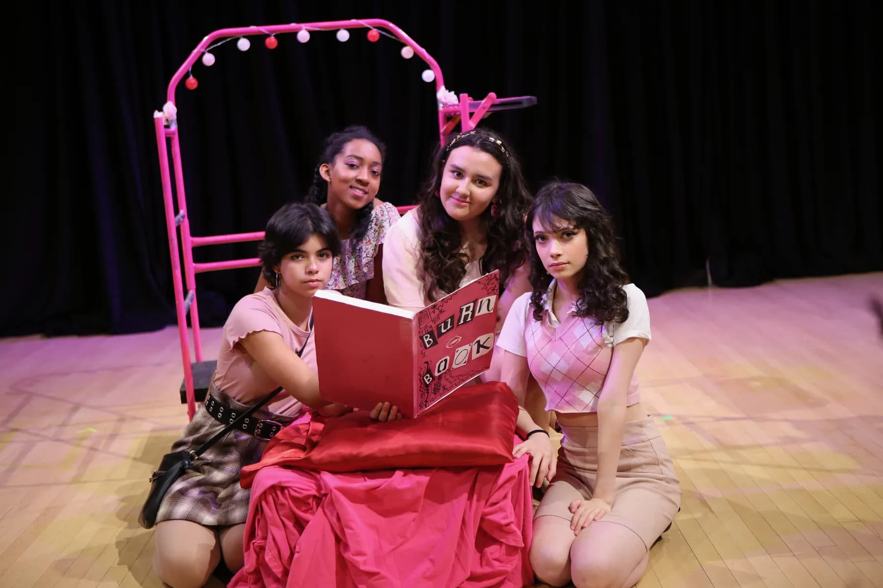 OVATION! students performing a Burn Book scene during the Musical Theatre Production in Richmond Hill