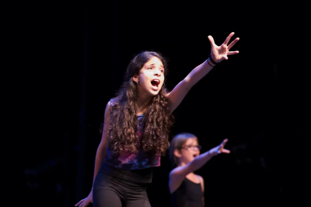 OVATION! student singing during the Winter Showcase performance in Richmond Hill