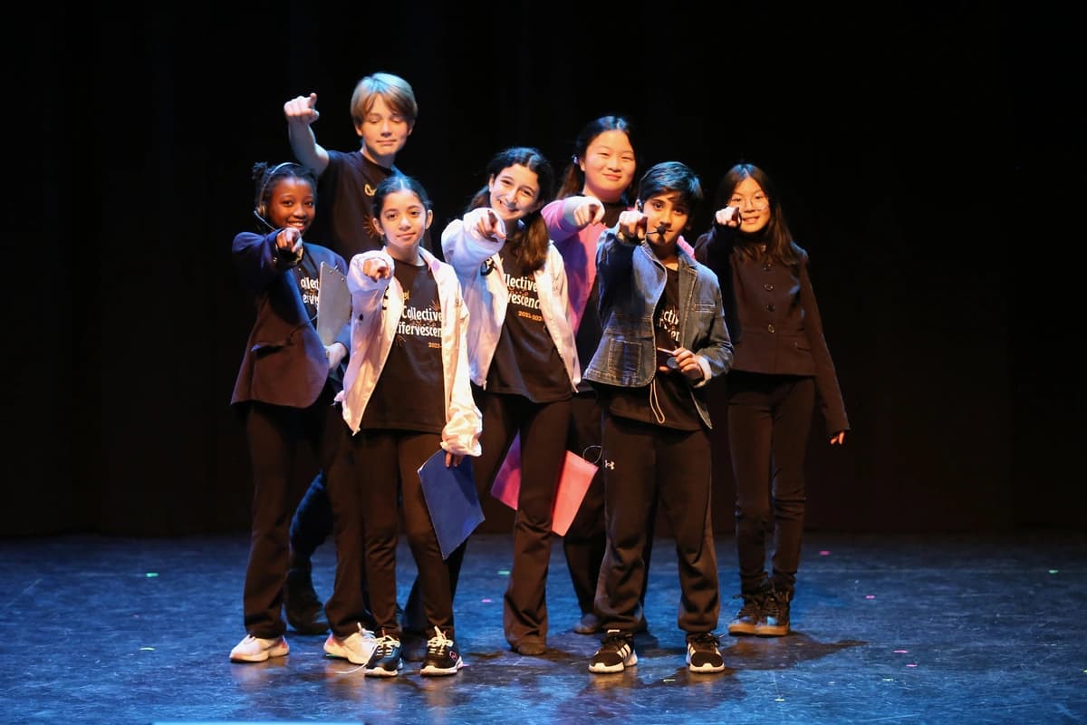 OVATION! comedy class students pointing at the camera during a Richmond Hill performance