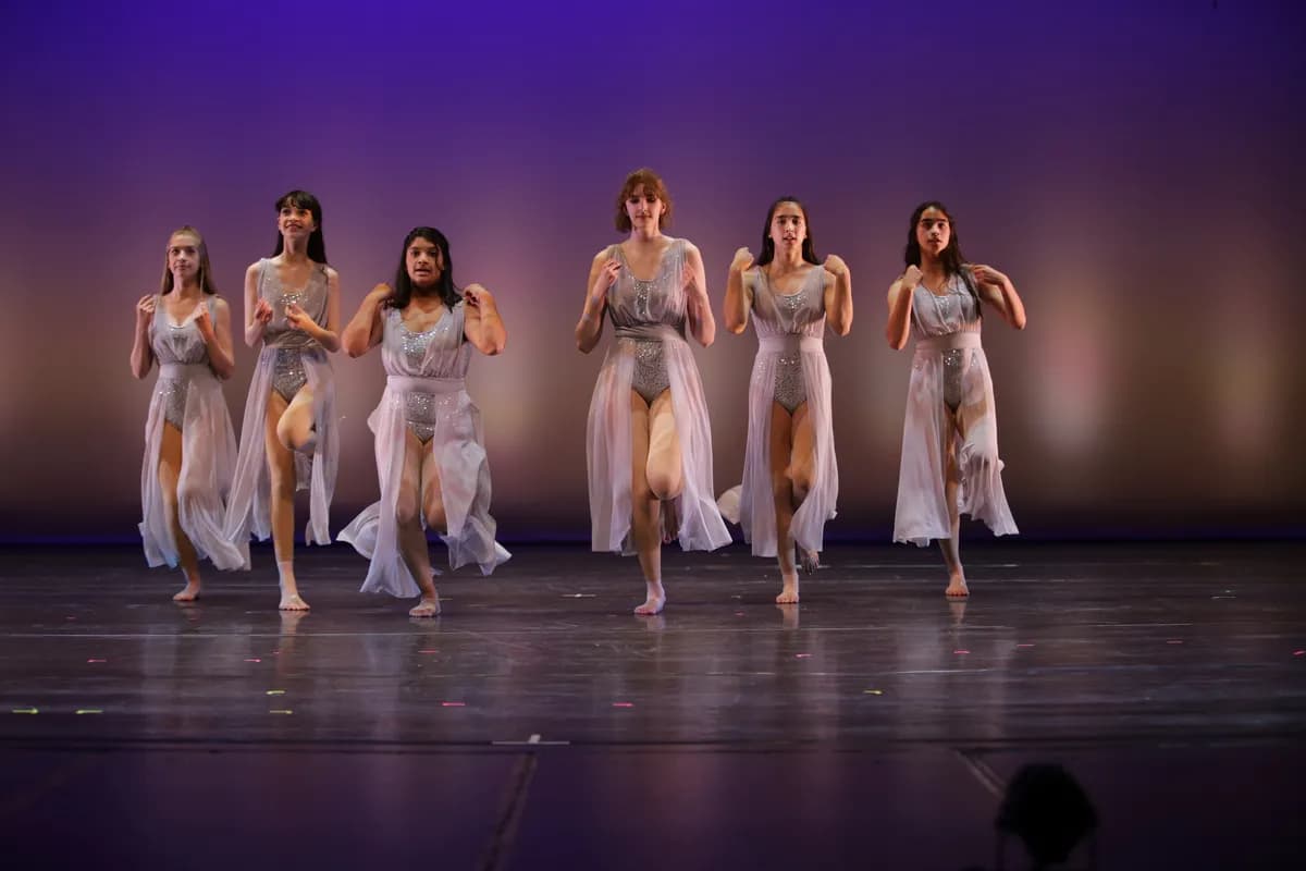 OVATION! contemporary dance class performing in sheer white costumes at a Richmond Hill showcase