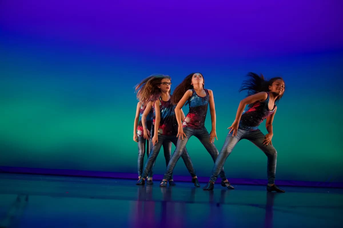 OVATION! kids contemporary dance class performing under blue and green light in Richmond Hill