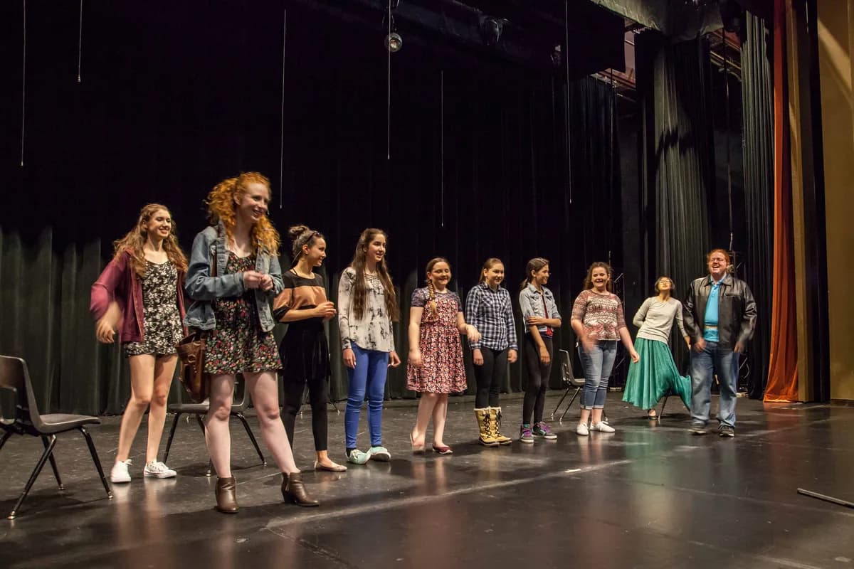 OVATION! musical theatre students lined up across the stage during a play in Richmond Hill