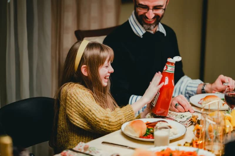 OVATION! screen acting students performing a family dinner scene on set