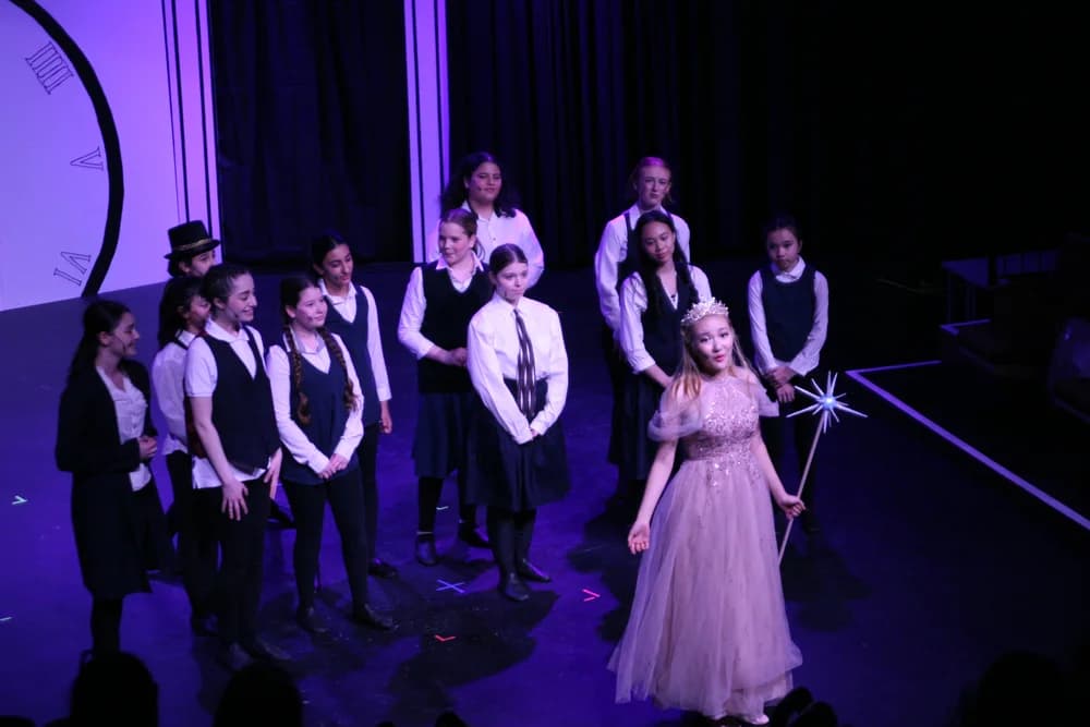 OVATION! summer musical production cast under purple lights with a performer in a pink gown in Richmond Hill