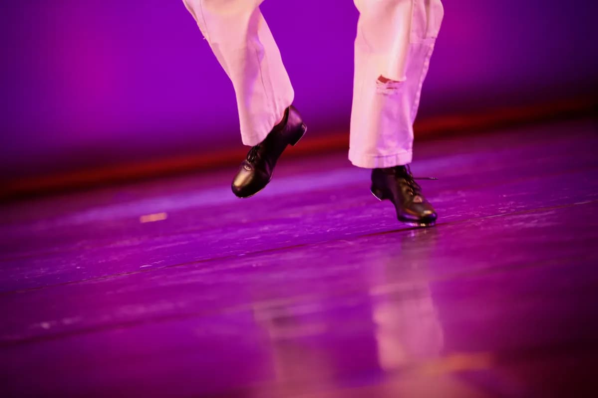 Close-up of OVATION! tap shoes mid-step during a Richmond Hill tap dance lesson