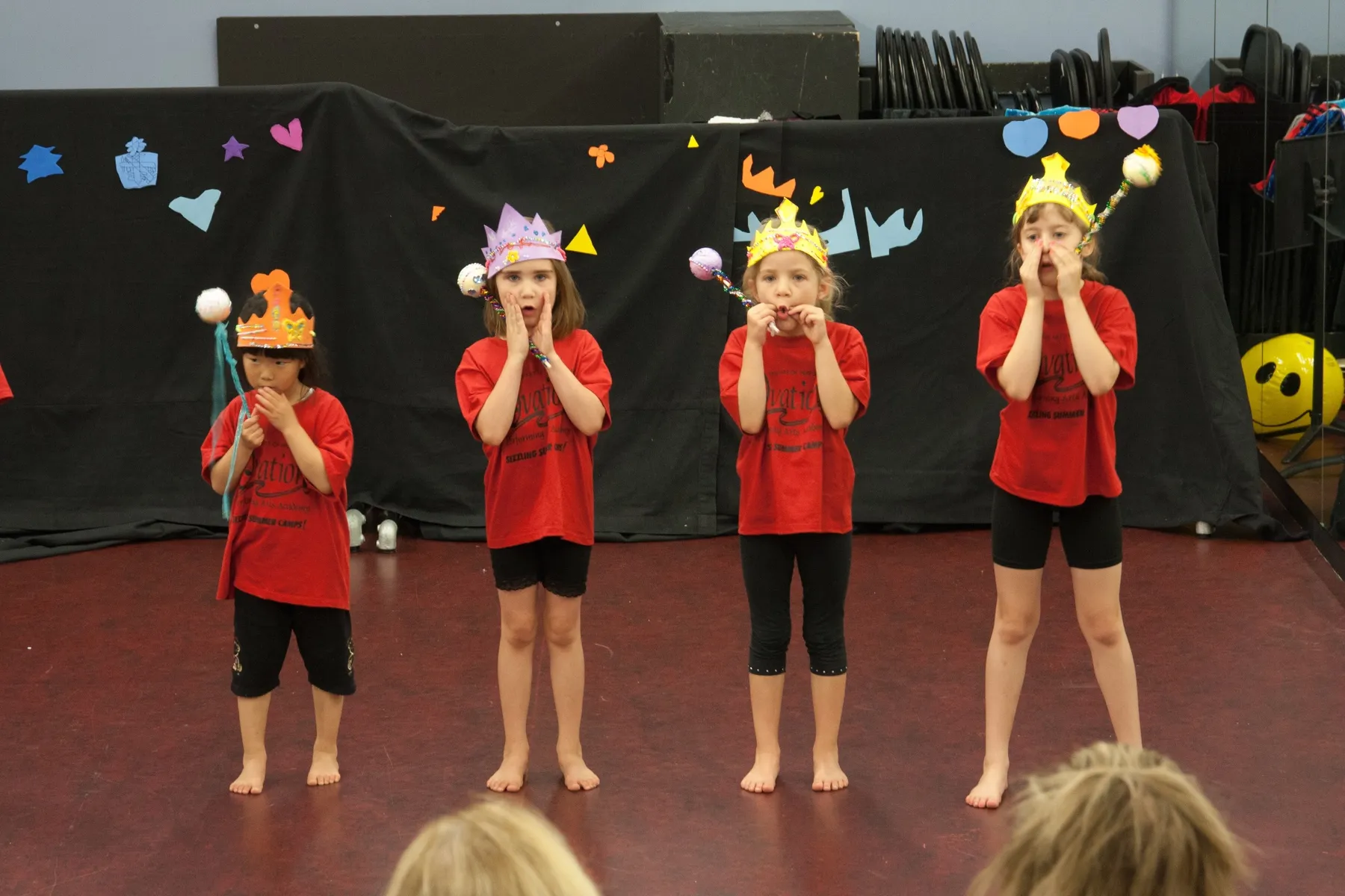 Kids performing in a musical theatre summer camp
