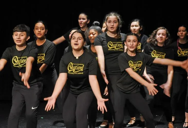Students practicing in a musical theatre dance skills class