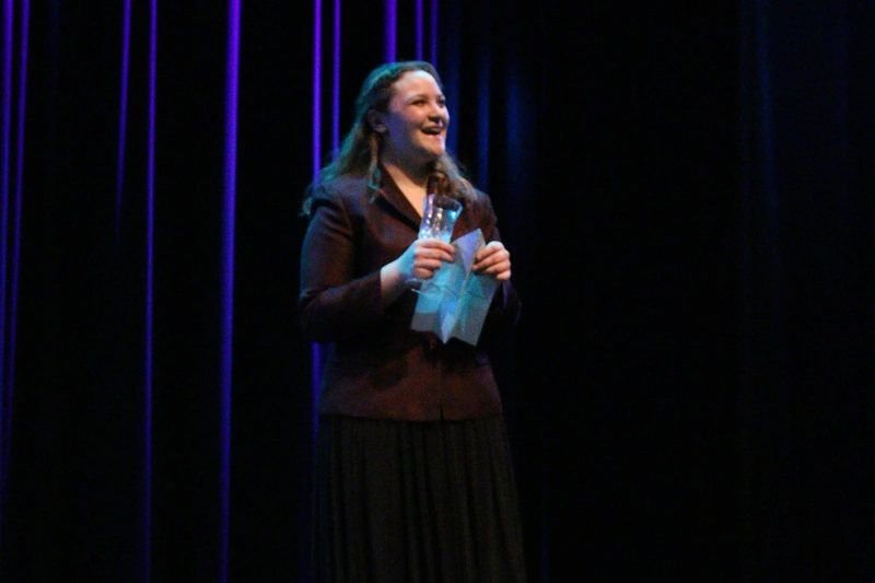 Senior acting student delivering a scene on stage at Richmond Hill senior stage acting class show
