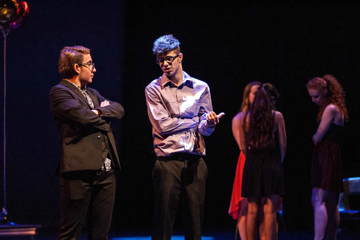 Students performing in stage acting class