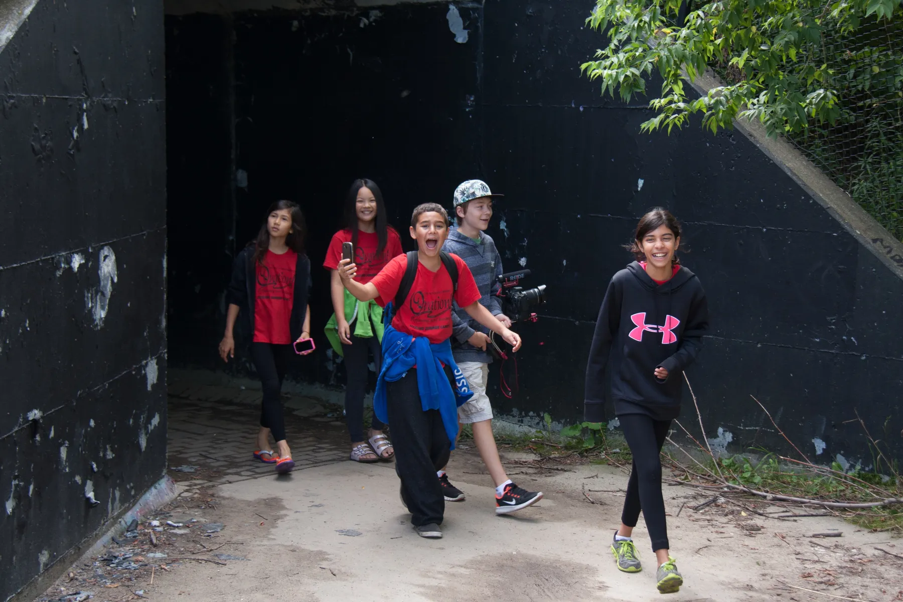Kids walking during a summer camp activity