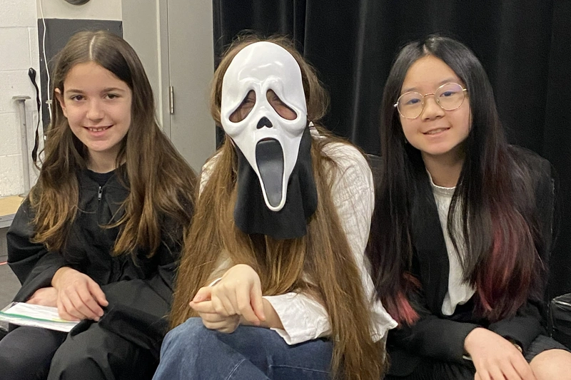 Young performers in costume with Scream mask on set of Richmond Hill summer movie production camp