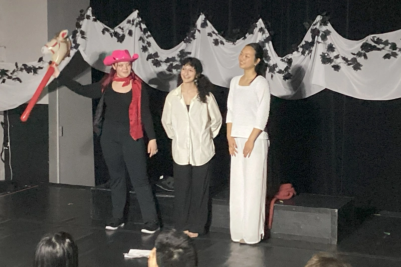 Young performers in Western-themed scene with stick horse during summer musical production in Richmond Hill