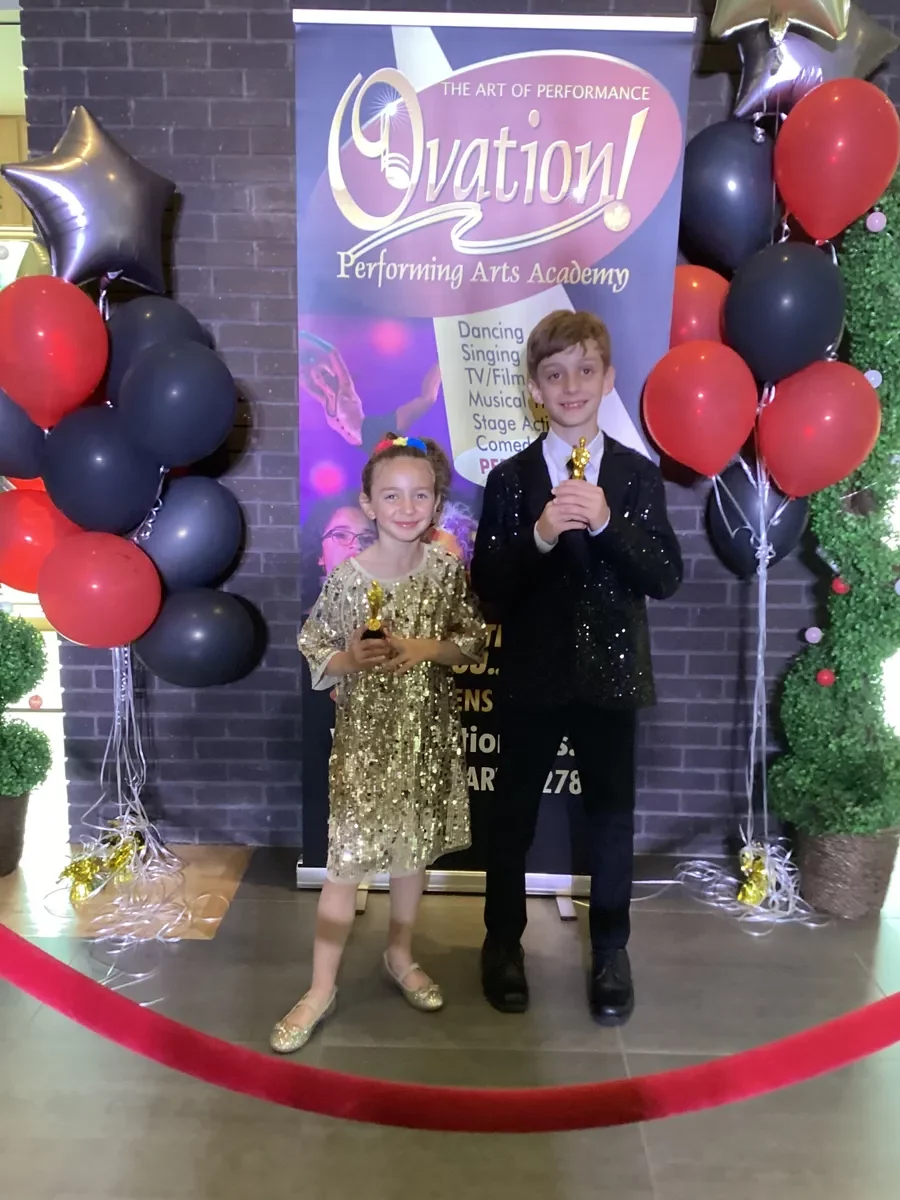 Ovation That's A Wrap Film Fest Students Holding Awards